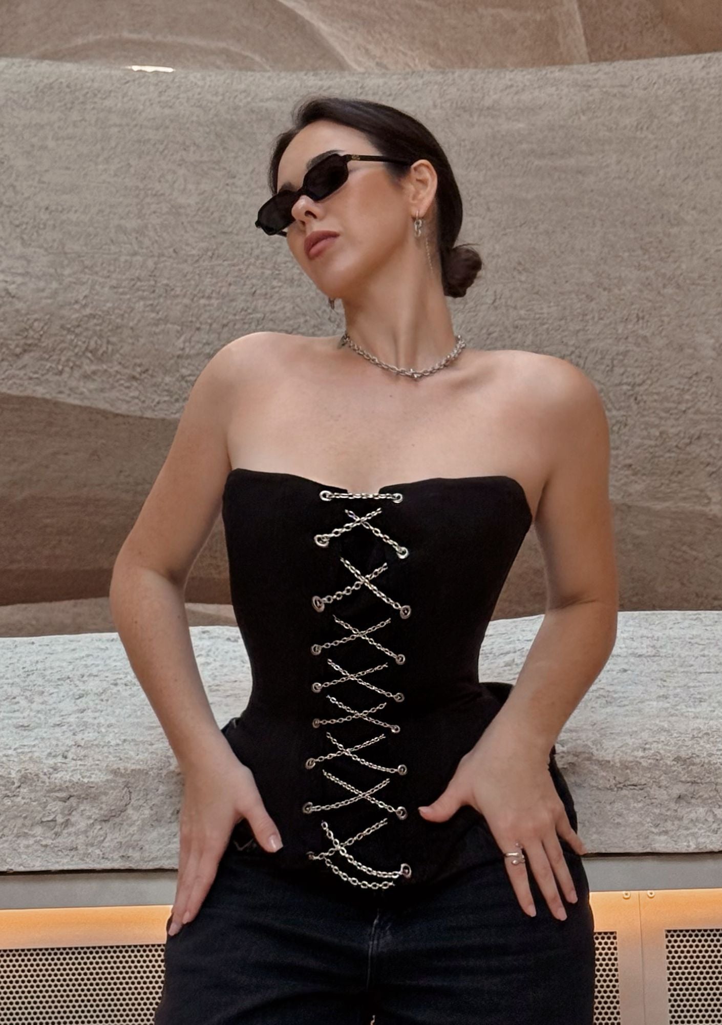 Black chain corset top by La Musa – luxury satin corset with metal chains