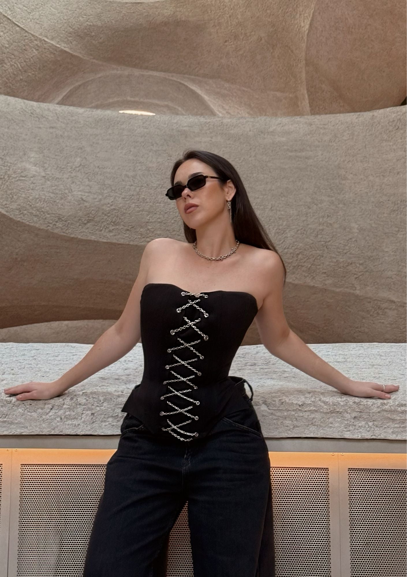 Black chain corset top by La Musa – luxury satin corset with metal chains