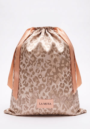 Feline drawstring pouch in warm beige-rose woven leopard jacquard with powder-pink satin ribbons