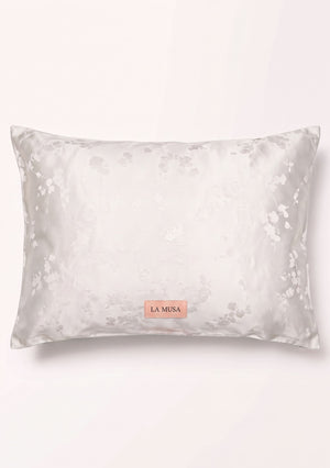 Moonveil 51 x 66 cm pillowcase in ivory woven floral jacquard with soft peach-pink LA MUSA tag