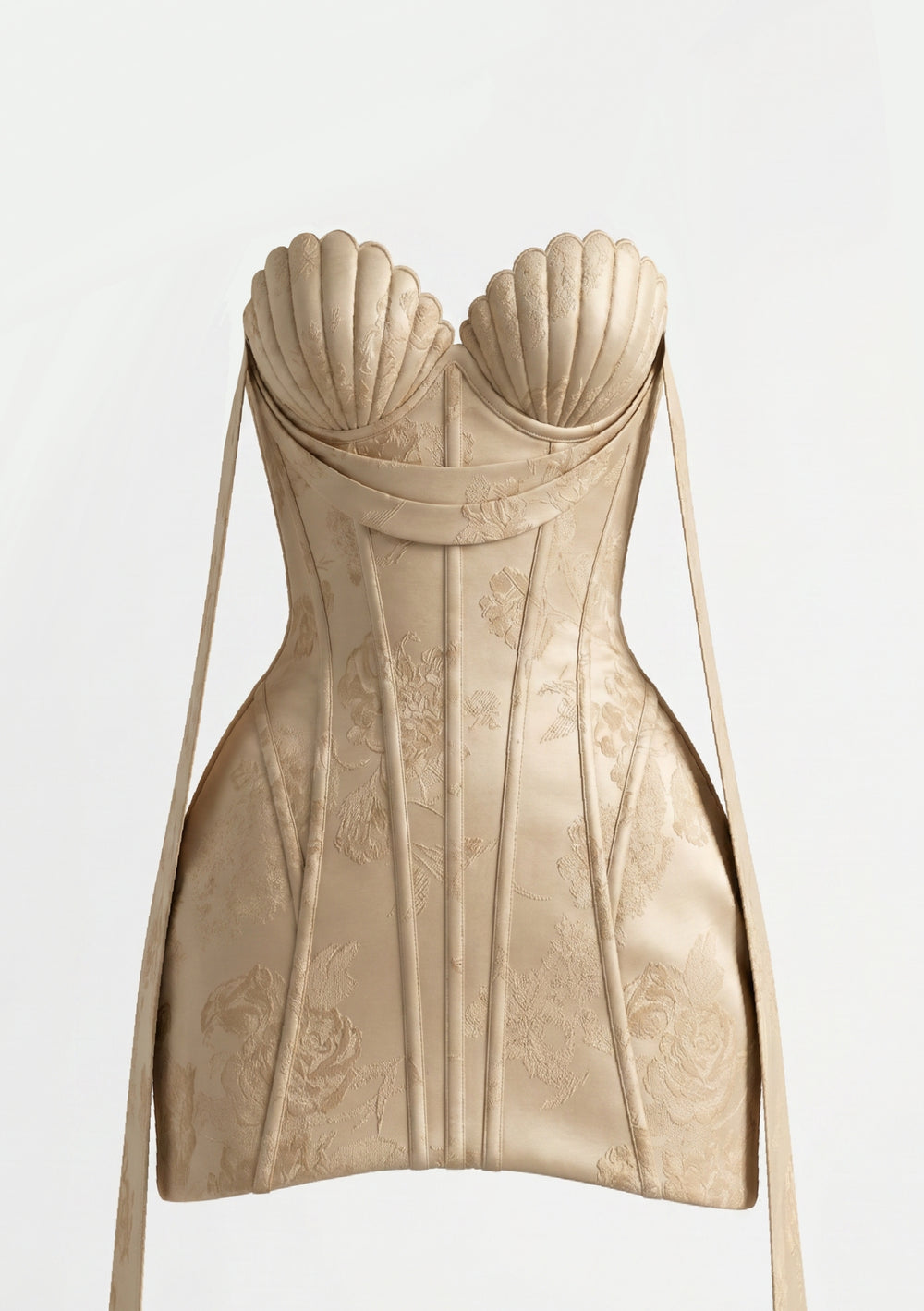 Nacre champagne jacquard corset mini dress front view with sculpted shell cups and floor-length ribbon tied as a neck wrap