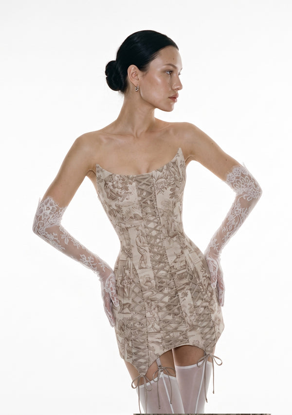 Full front view of the white lace opera gloves styled with the Lucentia corset mini dress and white stockings with garter ties