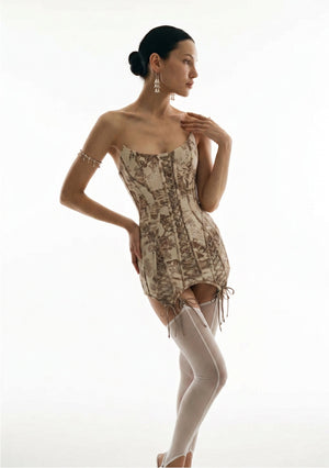 Ivoria toile corset mini dress full length front view with pointed satin-tie hem