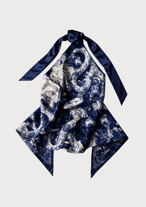 Mirage Peony top shown flat, the plain navy collar with its two long silk ties above the printed body and its pointed corners