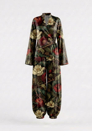 Eden silk set shown on an invisible mannequin, wrap top with its self-tie sash knotted at the side above wide trousers finishing in elasticated ankle cuffs