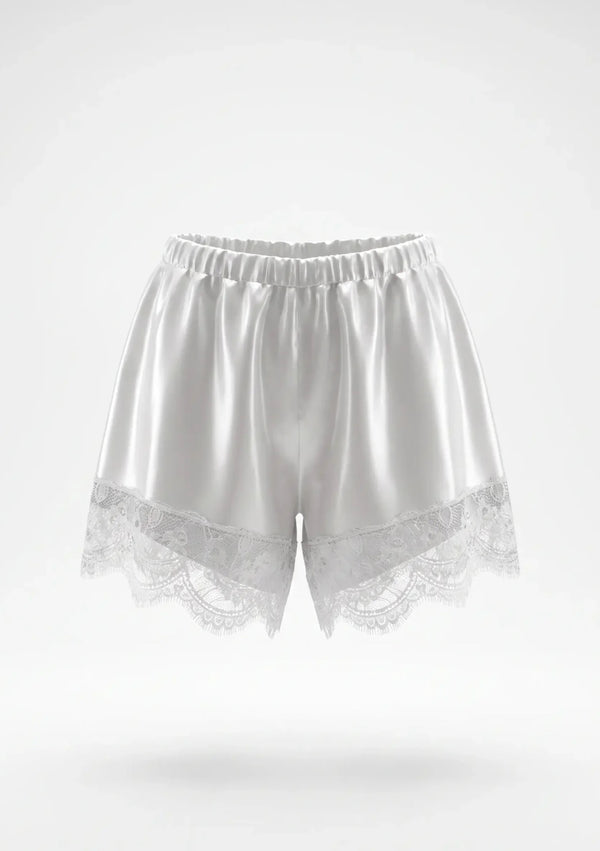 White satin shorts product shot showing elastic gathered waistband and wide scalloped floral lace hem