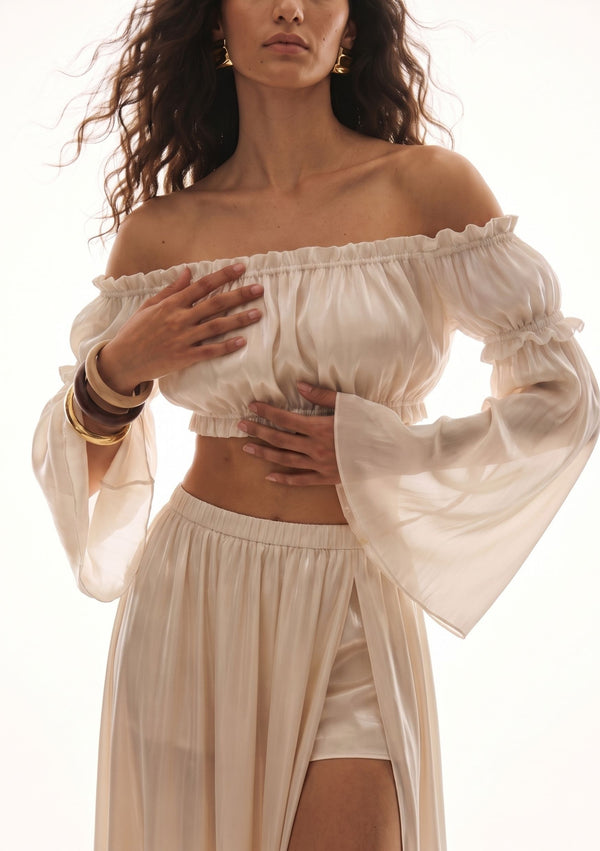 Sirocco flared detachable sleeves worn with the Sirocco set, front view showing elasticated band and sheer cuff