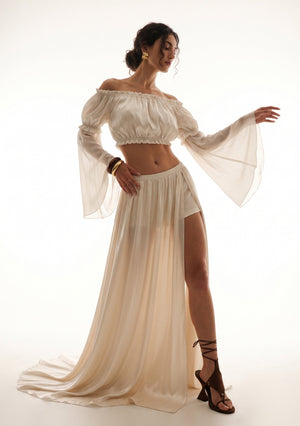 Sirocco cream satin-chiffon maxi skirt worn on-model, front full-length view with high slit styled with the matching crop top