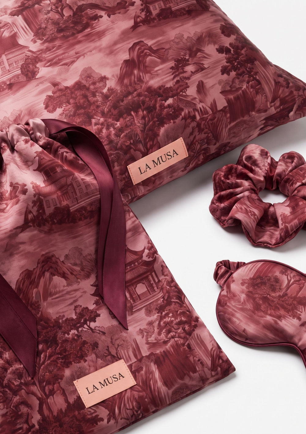 Crimson Dusk Sleep Set with pillowcase, eye mask, scrunchie and pouch in deep burgundy landscape print with pagodas and mountains