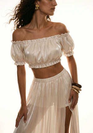 Sirocco cream satin crop top front view with puffed sleeves and matching maxi skirt