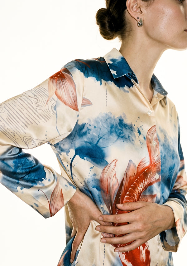 Sumi Set close-up detail of the satin shirt, showing the pointed collar, button placket, wide cuff and painted koi print