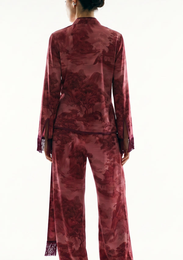 Crimson Dusk Set back detail, burgundy satin top over matching printed trousers with the long fringed sash hanging down one side