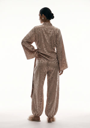 Back view of the Feline set, the leopard jacquard running across the shirt and down the full length of the trousers