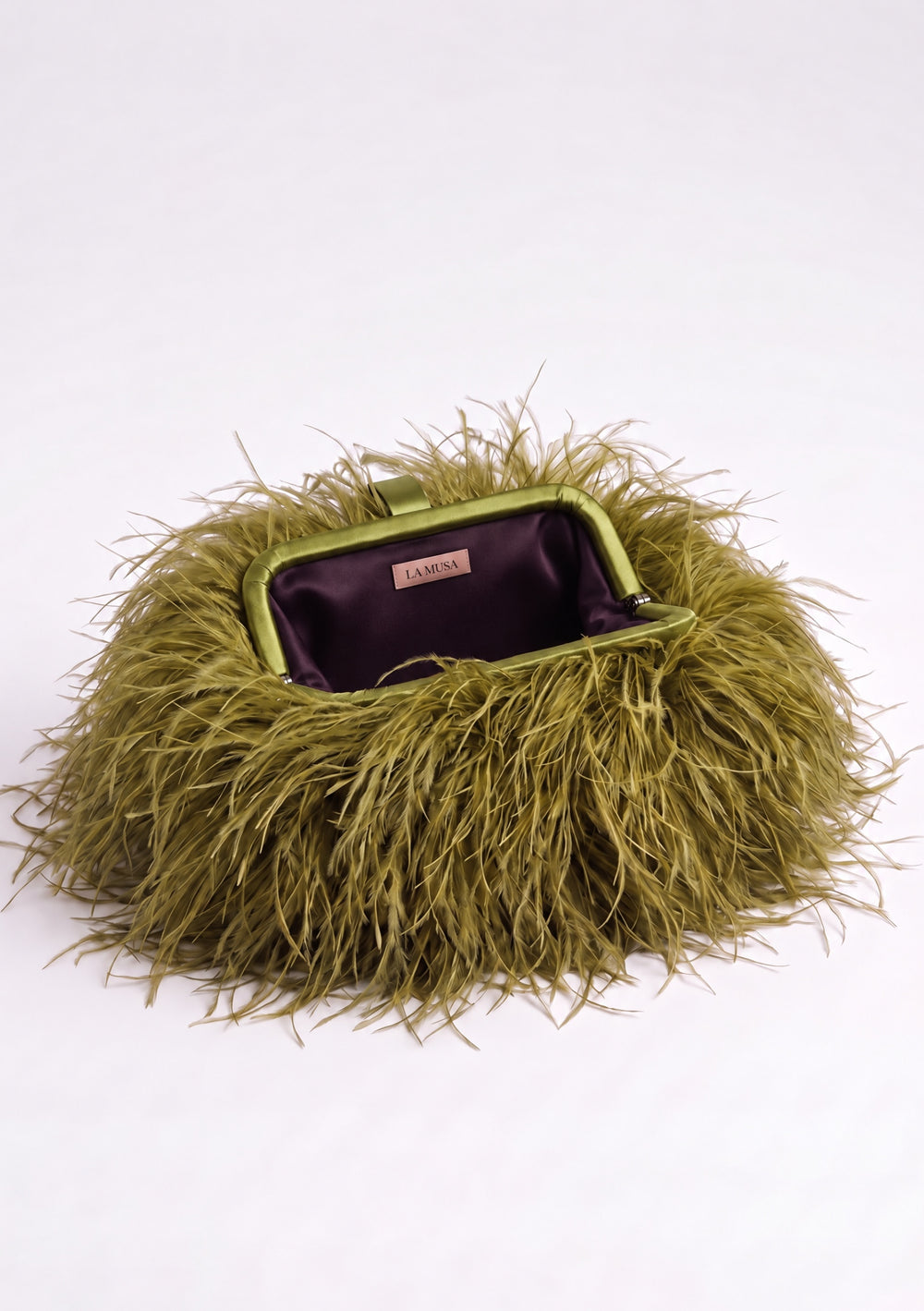 Olive Feather Bag open: olive green ostrich feather clutch with a matching frame and plum lining.
