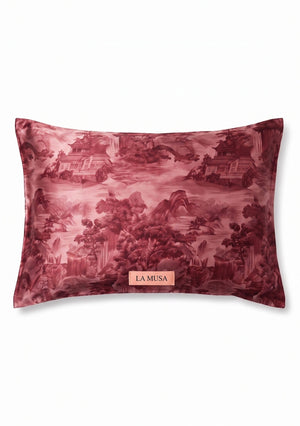 Crimson Dusk 51 x 66 cm pillowcase in deep burgundy landscape print with pagodas and mountains with soft peach-pink LA MUSA tag