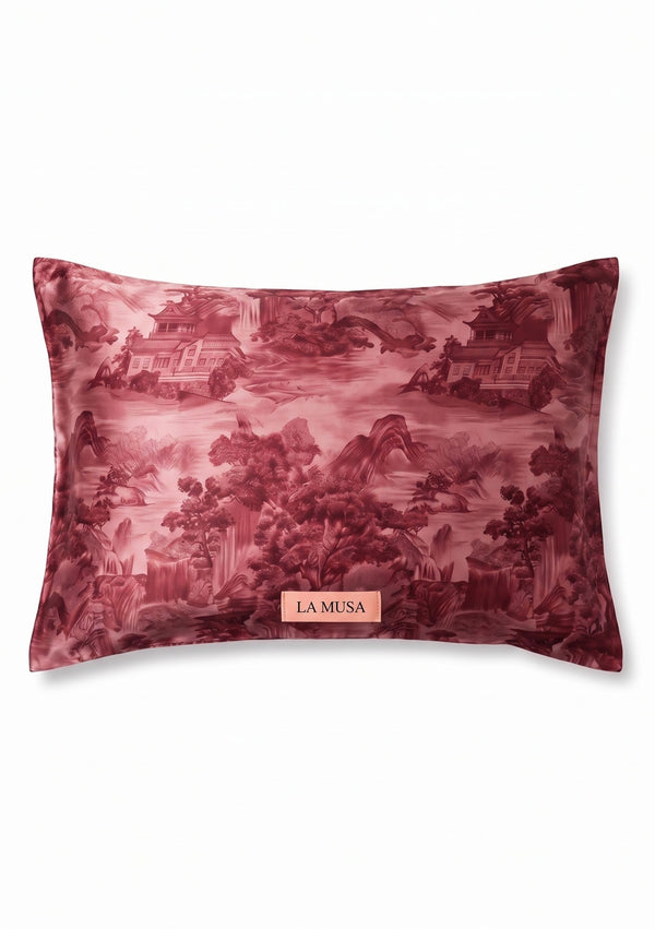 Crimson Dusk 51 x 66 cm pillowcase in deep burgundy landscape print with pagodas and mountains with soft peach-pink LA MUSA tag