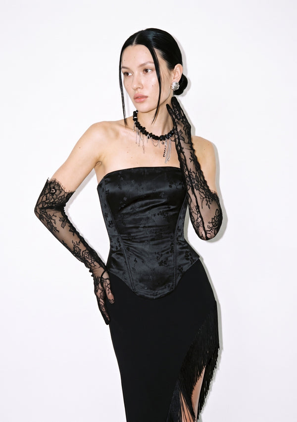 Spell Corset with the fringed Spell Skirt and black lace opera gloves, three-quarter view.