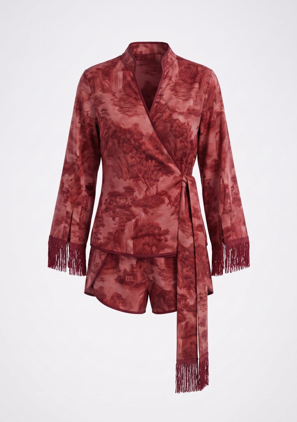 Crimson Dusk Mini Set, burgundy printed satin pajama set, full-length front view of model in fringed wrap top and mini shorts with sash tied at the side
