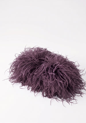Plum Feather Bag, a dusty plum ostrich feather clutch, side view.