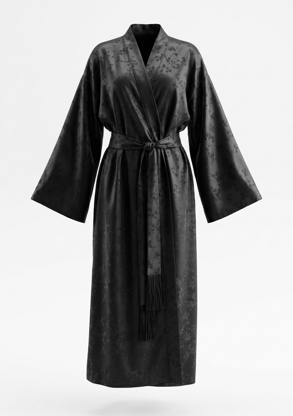 Tenebrae Robe on model, full-length front view of the floor-length black satin jacquard wrap robe with shawl collar, wide sleeves and fringed sash