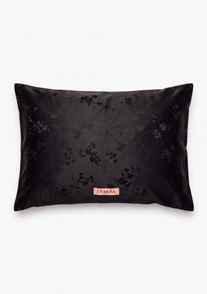 Tenebrae 51 x 66 cm pillowcase in deep black woven floral jacquard with soft peach-pink LA MUSA tag