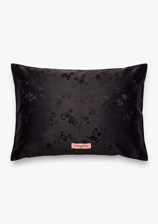 Tenebrae 51 x 66 cm pillowcase in deep black woven floral jacquard with soft peach-pink LA MUSA tag