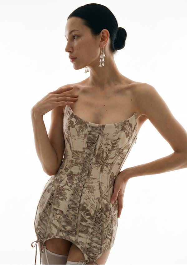 Ivoria toile corset mini dress three quarter front view with side lace-up panels