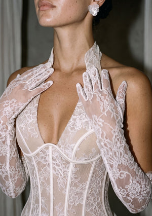 Close-up of the Calla halter neckline and floral lace bodice