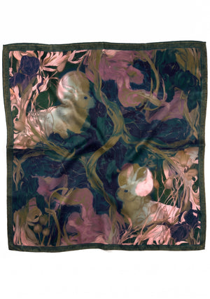 Selene silk scarf shown flat as a full square, two white hares among irises and golden vines on deep green
