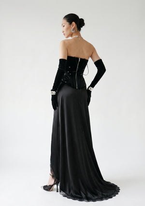 La Musa Midnight black satin maxi skirt, back view, styled with the Midnight velvet corset and opera gloves