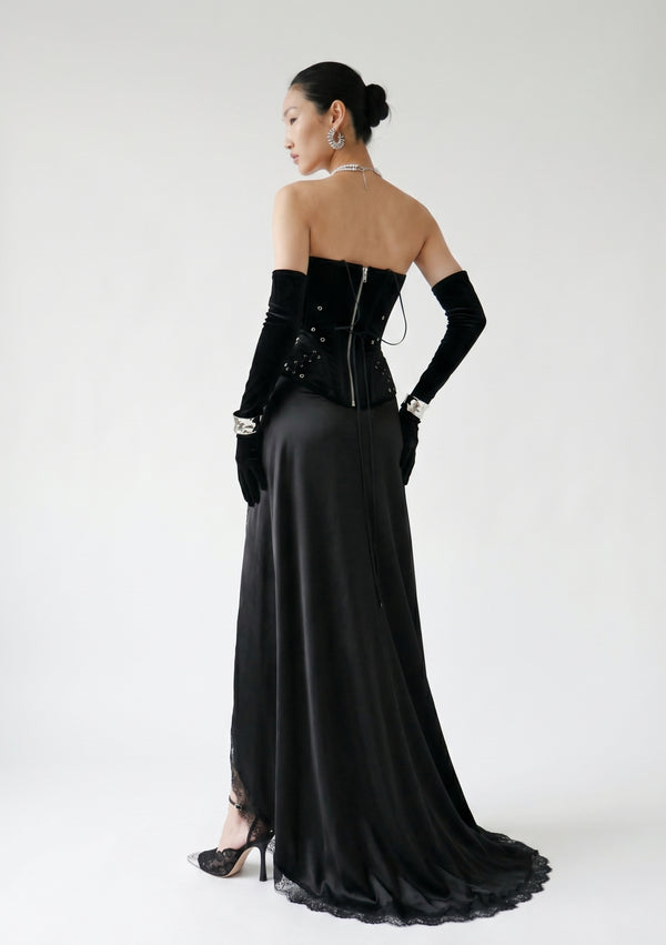 La Musa Midnight black satin maxi skirt, back view, styled with the Midnight velvet corset and opera gloves