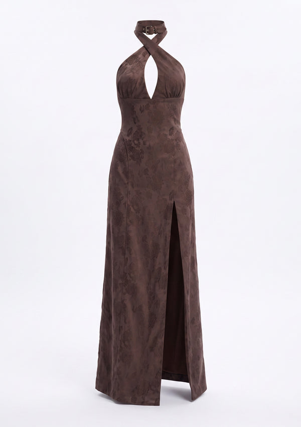 Rhiannon maxi dress shown on an invisible mannequin, crossover halter straps rising to a buckled collar, seam under the bust and the slit running to the hip
