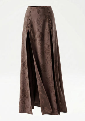La Musa Baroque Skirt product shot: brown floral-jacquard maxi skirt with twin thigh-high slits and fabric-covered button plackets