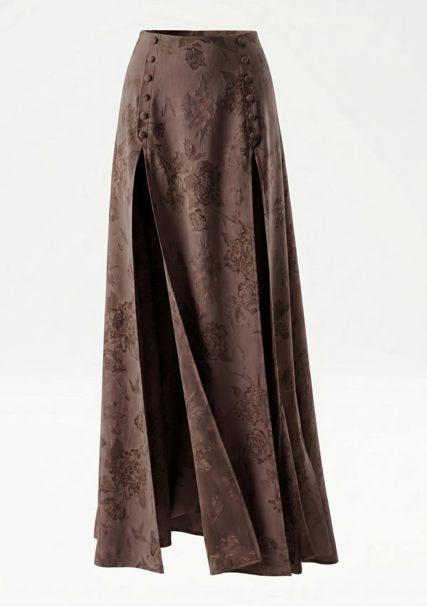 La Musa Baroque Skirt product shot: brown floral-jacquard maxi skirt with twin thigh-high slits and fabric-covered button plackets