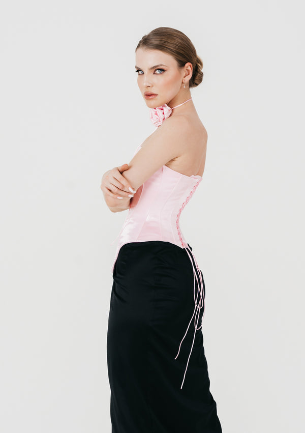 Back and side view of pink satin Marshmellow corset showing the lace-up closure and long ties